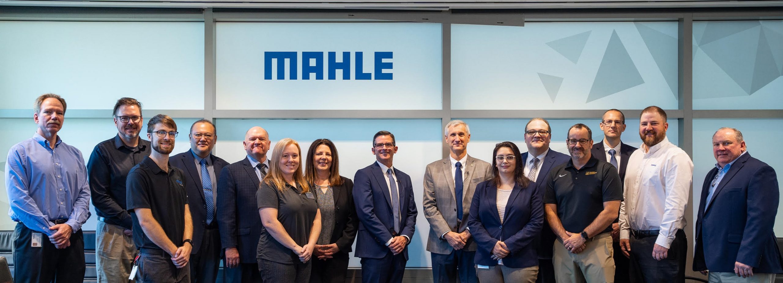 Leaders from MAHLE and Michigan Tech gather at the signing ceremony.